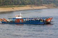 Nile River, near Aswnm, Egypt, February 21, 2017: Ferry transporting people crossing the Nile River and full of Arabian Egyptians