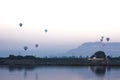 Nile river at sunrise with hot air balloons in Luxor, Egypt. Royalty Free Stock Photo