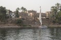 The Nile River in the vicinity of Luxor, Egypt, Africa with its crops, its boats, its towns and its cruise ships. Royalty Free Stock Photo