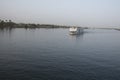 The Nile River in the vicinity of Luxor, Egypt, Africa with its crops, its boats, its towns and its cruise ships. Royalty Free Stock Photo