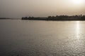 The Nile River in the vicinity of Luxor, Egypt, Africa with its crops, its boats, its towns and its cruise ships. Royalty Free Stock Photo