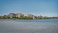 Nin village, residential district and coastline with pier and moored boats Royalty Free Stock Photo