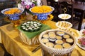 Nine auspicious thai desserts and many sweets snacks thai style for travelers people eating at restaurant cafe