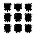 Nine Black Shield Emblems With Textured Outline Variations badge crest Royalty Free Stock Photo