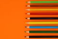 Nine colorful pencils