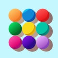 Nine Colorful Spheres in a Grid on Blue Background Royalty Free Stock Photo