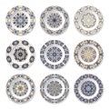 Nine decorative plates with circular colored pattern