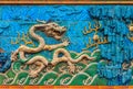 Nine Dragon Wall of marble carving of dragons playing with pearl Royalty Free Stock Photo