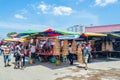 During the The Nine Emperor Gods Festival,there are some stalls selling religious prayer ornaments and other accessories.People ca