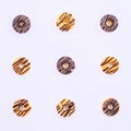 Nine Glased Donuts on the white background. Royalty Free Stock Photo