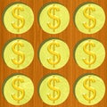 Nine gold dollar coins on wooden desk pattern texture