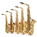 Nine Golden Saxophones isolated on white background Royalty Free Stock Photo