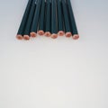 Nine wood pencils in group