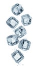 nine ice cubes falling with water droplets isolated Royalty Free Stock Photo