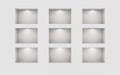 Nine illuminated niches on a white wall. Place for an exhibition. Top view mockup template for design. Light effect on a Royalty Free Stock Photo