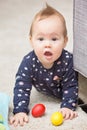 Nine months old baby girl playing with her toys Royalty Free Stock Photo
