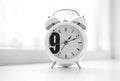Nine o`clock morning clock bokeh background Royalty Free Stock Photo