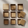 Nine open cardboard boxes arranged in a grid on a flat surface. The boxes are light brown, casting Royalty Free Stock Photo