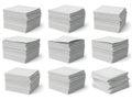 Nine stacks of pristine white paper sheets Royalty Free Stock Photo
