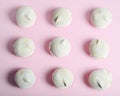 Nine vanilla marshmallows on a pink background Royalty Free Stock Photo