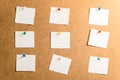 Nine white stickers for taking notes on a cardboard background