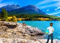 Nine-year-old boy with a globe in his hands Royalty Free Stock Photo