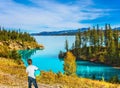 Nine-year-old boy in jeans with globe Royalty Free Stock Photo