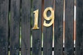 Nineteen Number Address House on Gate