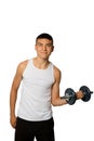 Nineteen year old teen boy exercising with a dumbbell Royalty Free Stock Photo