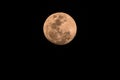 Ninety Nine Percent Full Moon in a hazy smoky night sky