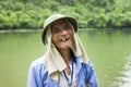 Ninh Binh, Vietnam - May 16, 2015: Close-up portrait of old tourist rowing boat man at Tam Coc travel destination, Ninh Binh