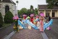 Ninh Binh, Vietnam - May 16, 2015: Vietnamese Christian women perform an old traditional dance on Flower offering to Mother day at