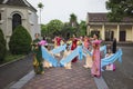 Ninh Binh, Vietnam - May 16, 2015: Vietnamese Christian women perform an old traditional dance on Flower offering to Mother day at