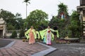 Ninh Binh, Vietnam - May 16, 2015: Vietnamese Christian women perform an old traditional dance on Flower offering to Mother day at