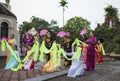 Ninh Binh, Vietnam - May 16, 2015: Vietnamese Christian women perform an old traditional dance on Flower offering to Mother day at