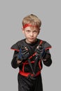 Ninja boy with kunai Royalty Free Stock Photo