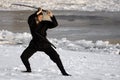 Ninja with sword at winter Royalty Free Stock Photo