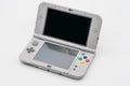 Nintendo 3DS LL Super Famicom Edition. Portable game by Nintendo