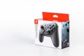 Nintendo Pro Controller in box for Nintendo Switch, black console for gamers on white background