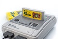 Nintendo 1990`s hit super mario world cartridge plug in the original Nintendo Super Famicom