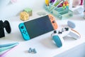 Nintendo Switch Oled console on a teenager\'s desktop. Royalty Free Stock Photo