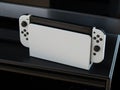Nintendo Switch OLED Model in handheld mode. Popular mobile gaming console