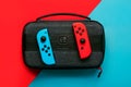 Nintendo Switch video game console with Nintendo two Joy-Cons and Nintendo switch bag Royalty Free Stock Photo