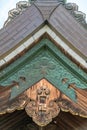 Niomon (guardian gate), Mitsubana Gegyo (Gable pendant) Hassou (Metal ornament) roof detail at Zenko-ji Temple complex Royalty Free Stock Photo