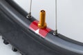 Nipple on bicycle rim for tubeless system