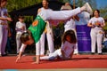 Dynamic Capoeira Showcase: Gravity-Defying Acrobatics on the Open Stage