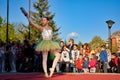 Graceful Ballet: A Little Ballerina's Serenade on the Open Stage Royalty Free Stock Photo