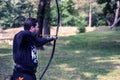 The Skilled Archer: A Mesmerizing Display of Archery Mastery in Historical Costume