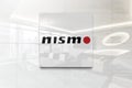 Nismo on glossy office wall realistic texture