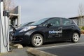 Nissan Leaf King County MetroPool electric vehicle charging side view